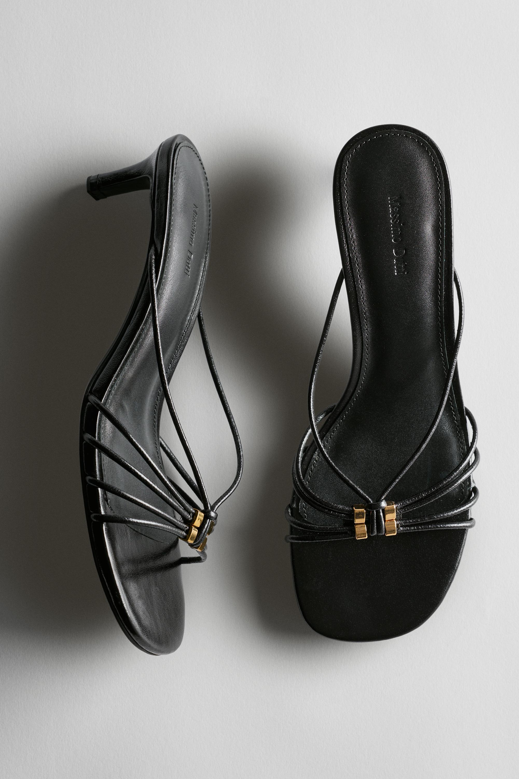 Strappy heeled sandals with embellished detail